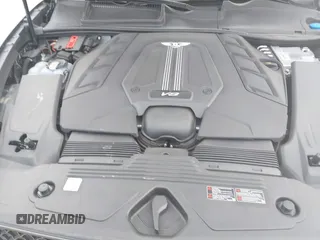 2021 Bentley Bentayga V8 z VIN SJAAM2ZV5MC038171, wystawiony jako IAAI lot #42057762 z przebiegiem 25 973 mil mil oraz . Historia ofert i sprzedaży dostępna na DreamBid. Obrazek 10.