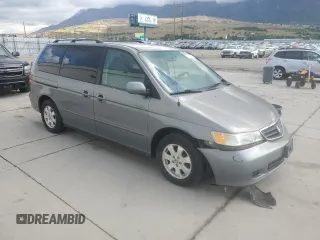 2002 Honda Odyssey EX z VIN 5FNRL18652B014929, wystawiony jako Copart lot #57185775 z przebiegiem 291 807 mil mil oraz Czysty tytuł • Clean title. Historia ofert i sprzedaży dostępna na DreamBid. Obrazek 4.
