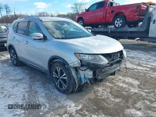2018 Nissan Rogue S with VIN 5N1AT2MT2JC738034, listed as a IAAI auction lot 41286839 with 125,037 mi miles. Bid and sale history available at carsss.com. Image 1.