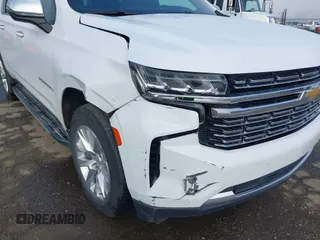 2023 Chevrolet Suburban Premier with VIN 1GNSKFKD1PR253914, listed as a IAAI auction lot 41823036 with 62,876 mi miles and . Bid and sale history available at DreamBid. Image 6.