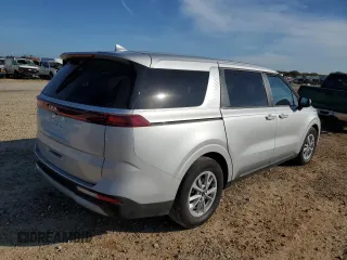 2023 Kia Carnival LX with VIN KNDNB4H39P6273290, listed as a Copart auction lot 82188894 with 22,612 mi miles and Salvage Title. Bid and sale history available at carsss.com. Image 3.