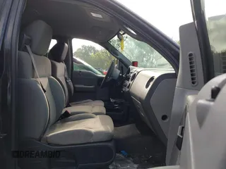 2008 Ford F-150 XL with VIN 1FTRF12268KF03798, listed as a IAAI auction lot 42030835 with 202,239 mi miles. Bid and sale history available at carsss.com. Image 5.