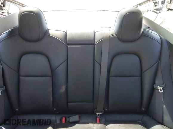 2018 Tesla Model 3 Long Range Battery z VIN 5YJ3E1EA2JF095525, wystawiony jako IAAI lot #42148713 z przebiegiem Nie podano mil oraz . Historia ofert i sprzedaży dostępna na DreamBid. Obrazek 8.