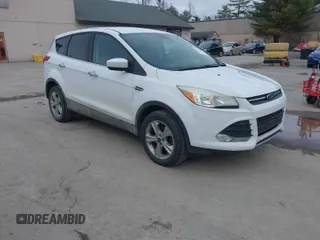 2016 Ford Escape SE with VIN 1FMCU9GX1GUA76589, listed as a IAAI auction lot 42014929 with 125,294 mi miles. Bid and sale history available at carsss.com. Image 1.