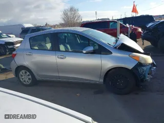 2012 Toyota Yaris L with VIN JTDKTUD36CD511401, listed as a IAAI auction lot 41321430 with 150,896 mi miles. Bid and sale history available at carsss.com. Image 13.