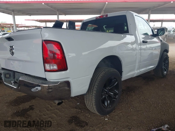 2012 Ram 1500 ST with VIN 3C6JD6AK9CG163832, listed as a IAAI auction lot 42380321 with 171,421 mi miles and . Bid and sale history available at DreamBid. Image 4.