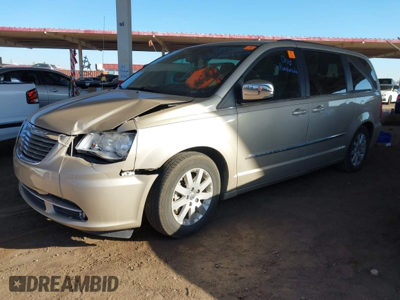 2012 Chrysler Town & Country Touring-L with VIN 2C4RC1CG7CR237270, listed as a IAAI auction lot 41858884 with 187,929 mi miles. Bid and sale history available at carsss.com. Image 2.