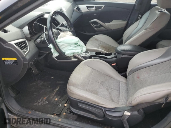 2014 Hyundai Veloster z VIN KMHTC6AD8EU193177, wystawiony jako Copart lot #55472315 z przebiegiem 90 633 mil mil oraz Szkoda całkowita • Salvage title. Historia ofert i sprzedaży dostępna na DreamBid. Obrazek 7.