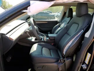 2024 Tesla Model Y Long Range with VIN 7SAYGDEE4RF990274, listed as a Copart auction lot 54239025 with 8,726 mi miles and Salvage title. Bid and sale history available at DreamBid. Image 7.