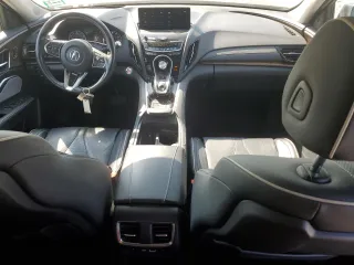 2019 Acura RDX Advance z VIN 5J8TC2H70KL007857, wystawiony jako Copart lot #59142485 z przebiegiem 152 307 mil mil oraz Czysty tytuł • Clean title. Historia ofert i sprzedaży dostępna na DreamBid. Obrazek 8.