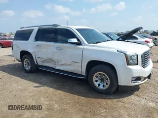 2019 GMC Yukon XL SLT with VIN 1GKS1GKC2KR117197, listed as a IAAI auction lot 41930764 with 47,350 mi miles. Bid and sale history available at carsss.com. Image 1.