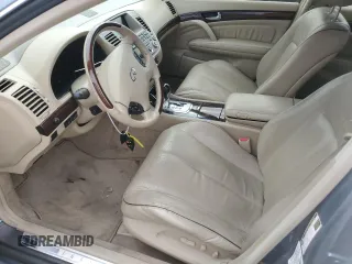 2005 Infiniti Q45 z VIN JNKBF01A85M101123, wystawiony jako Copart lot #72220124 z przebiegiem 111 464 mil mil oraz Szkody całkowita. Historia ofert i sprzedaży dostępna na DreamBid. Obrazek 7.