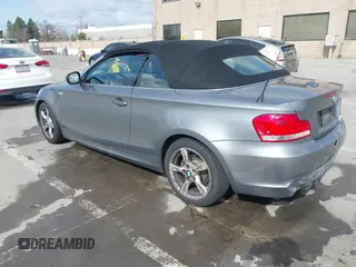 2012 BMW 1 Series 128i with VIN WBAUN1C52CVR00421, listed as a IAAI auction lot 41594256 with 107,957 mi miles and . Bid and sale history available at DreamBid. Image 3.