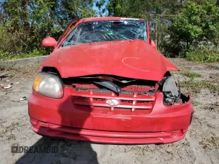 2005 Hyundai Accent GLS with VIN KMHCG45CX5U618473, listed as a Copart auction lot 76752994 with 0 mi miles and Salvage Title. Bid and sale history available at carsss.com. Image 5.