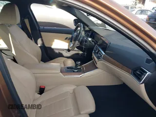 2019 BMW 3 Series 330i with VIN WBA5R1C56KAK08371, listed as a IAAI auction lot 41671953 with 52,433 mi miles and . Bid and sale history available at DreamBid. Image 5.