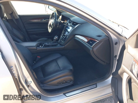 2014 Cadillac CTS Luxury AWD with VIN 1G6AX5S34E0124464, listed as a IAAI auction lot 42298607 with 89,351 mi miles and . Bid and sale history available at DreamBid. Image 5.