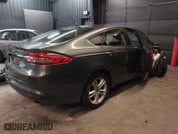 2018 Ford Fusion SE with VIN 3FA6P0HD5JR207844, listed as a IAAI auction lot 42534696 with 93,360 mi miles and . Bid and sale history available at DreamBid. Image 4.