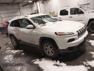 2014 Jeep Cherokee Latitude with VIN 1C4PJMCB7EW200880, listed as a IAAI auction lot 41610912 with 97,177 mi miles and . Bid and sale history available at DreamBid. Image 1.