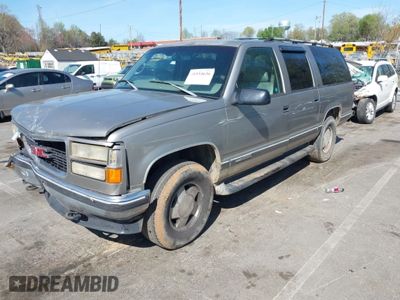 1999 GMC Suburban with VIN 3GKFK16R4XG514928, listed as a IAAI auction lot 41934636 with 245,010 mi miles and . Bid and sale history available at DreamBid. Image 17.