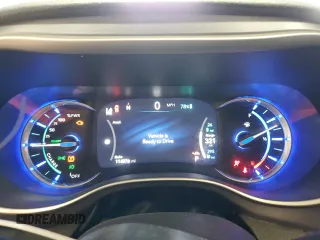 2021 Chrysler Pacifica Hybrid Touring L with VIN 2C4RC1L77MR596250, listed as a Copart auction lot 52892595 with 114,876 mi miles and Salvage title. Bid and sale history available at DreamBid. Image 9.