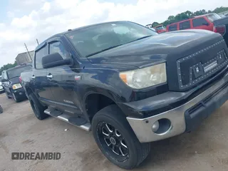 2013 Toyota Tundra Limited z VIN 5TFFY5F19DX142652, wystawiony jako IAAI lot #42165369 z przebiegiem 152 286 mil mil oraz . Historia ofert i sprzedaży dostępna na DreamBid. Obrazek 1.