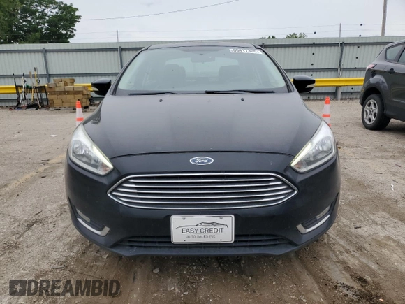 2017 Ford Focus Titanium with VIN 1FADP3J23HL218867, listed as a Copart auction lot 55417305 with 98,710 mi miles and Salvage title. Bid and sale history available at DreamBid. Image 5.