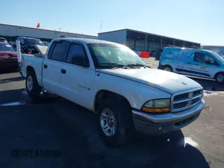 2001 Dodge Dakota Sport with VIN 1B7GL2AN81S127838, listed as a IAAI auction lot 40687174 with 235,301 mi miles. Bid and sale history available at carsss.com. Image 1.
