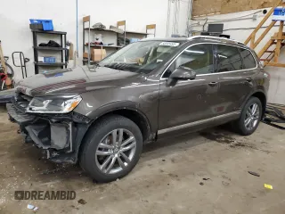 2016 Volkswagen Touareg Sport z VIN WVGEP9BPXGD006774, wystawiony jako Copart lot #56045495 z przebiegiem 85 695 mil mil oraz Szkoda całkowita • Salvage title. Historia ofert i sprzedaży dostępna na DreamBid. Obrazek 1.