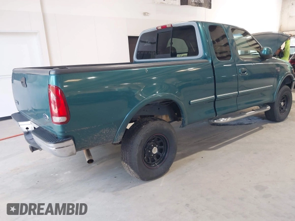 1998 Ford F-150 XL with VIN 1FTRX18L5WNB23716, listed as a IAAI auction lot 42579695 with 305,363 mi miles and . Bid and sale history available at DreamBid. Image 4.