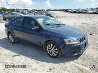 2012 Volkswagen Jetta SE with VIN 3VWDP7AJ7CM062149, listed as a Copart auction lot 62779485 with 154,771 mi miles and Salvage title. Bid and sale history available at DreamBid. Image 4.