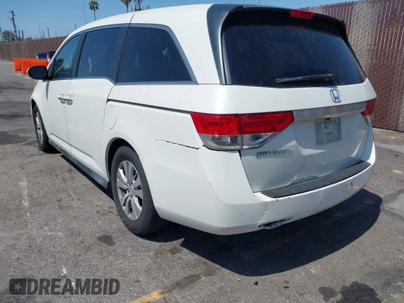 2015 Honda Odyssey EX-L with VIN 5FNRL5H67FB017554, listed as a IAAI auction lot 41974821 with 76,130 mi miles and . Bid and sale history available at carsss.com. Image 3.