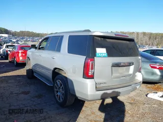 2018 GMC Yukon Denali with VIN 1GKS1CKJ9JR241330, listed as a IAAI auction lot 41180538 with 100,300 mi miles. Bid and sale history available at carsss.com. Image 3.