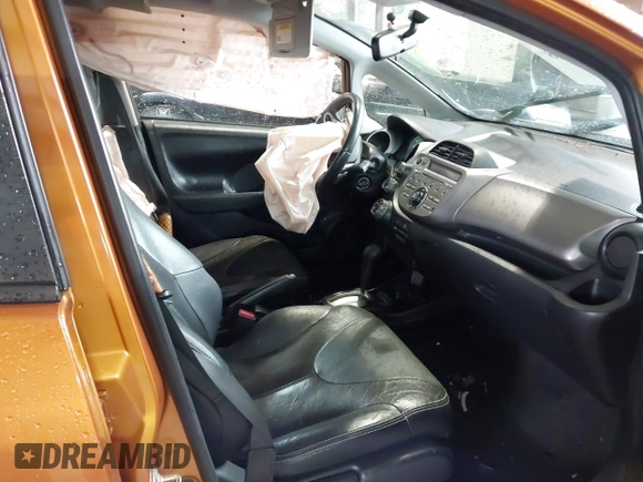 2009 Honda Fit Sport with VIN JHMGE88469S069328, listed as a IAAI auction lot 41464558 with 219,541 mi miles. Bid and sale history available at carsss.com. Image 5.