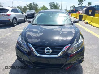 2016 Nissan Altima SR with VIN 1N4AL3AP4GC289147, listed as a IAAI auction lot 42159067 with 105,112 mi miles and . Bid and sale history available at carsss.com. Image 6.