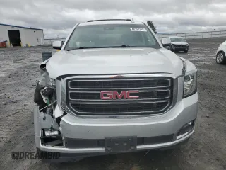 2015 GMC Yukon XL SLT with VIN 1GKS2HKC8FR616031, listed as a Copart auction lot 48740785 with 128,467 mi miles and Salvage Title. Bid and sale history available at carsss.com. Image 5.