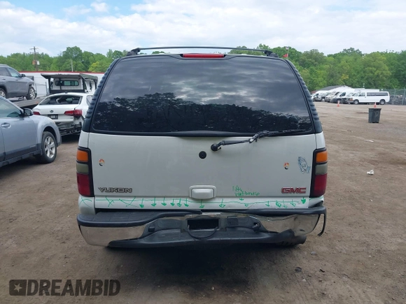 2005 GMC Yukon SLT z VIN 1GKEC13T75R114660, wystawiony jako IAAI lot #42223845 z przebiegiem 199 064 mil mil oraz . Historia ofert i sprzedaży dostępna na DreamBid. Obrazek 16.