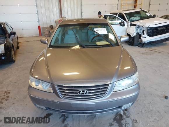 2007 Hyundai Azera SE z VIN KMHFC46F87A173110, wystawiony jako IAAI lot #42275974 z przebiegiem 208 901 mil mil oraz . Historia ofert i sprzedaży dostępna na DreamBid. Obrazek 6.