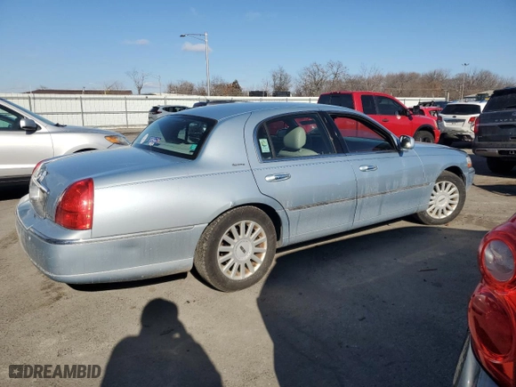 2005 Lincoln Town Car Signature with VIN 1LNHM81W65Y644390, listed as a Copart auction lot 88070925 with 184,453 mi miles and Salvage Title. Bid and sale history available at carsss.com. Image 3.