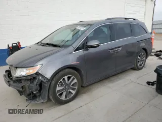 2014 Honda Odyssey Touring with VIN 5FNRL5H91EB121062, listed as a Copart auction lot 53546515 with 192,136 mi miles and Salvage title. Bid and sale history available at DreamBid. Image 1.