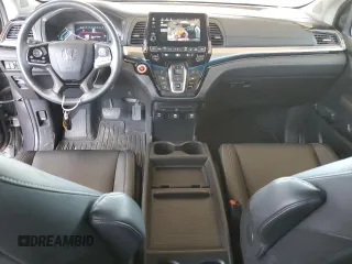 2021 Honda Odyssey Touring with VIN 5FNRL6H88MB040703, listed as a Copart auction lot 60340095 with 66,171 mi miles and Salvage title. Bid and sale history available at DreamBid. Image 8.