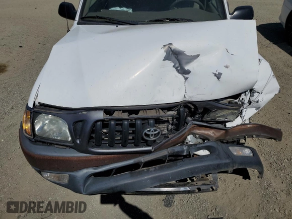 2002 Toyota Tacoma with VIN 5TENL42N22Z097170, listed as a Copart auction lot 58804945 with 103,290 mi miles and Salvage title. Bid and sale history available at DreamBid. Image 11.