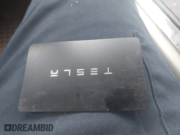 2023 Tesla Model 3 Long Range with VIN 5YJ3E1EB1PF393565, listed as a IAAI auction lot 41656060 with 16,236 mi miles and . Bid and sale history available at DreamBid. Image 11.