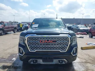 2021 GMC Sierra 1500 Denali with VIN 3GTP8FED0MG191202, listed as a IAAI auction lot 41484053 with 57,950 mi miles. Bid and sale history available at carsss.com. Image 6.