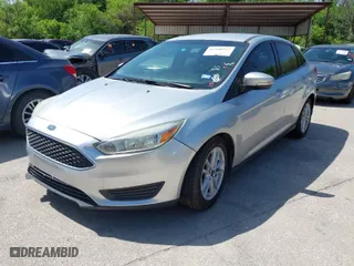 2017 Ford Focus SE with VIN 1FADP3F21HL263170, listed as a IAAI auction lot 41990977 with 104,794 mi miles. Bid and sale history available at carsss.com. Image 2.