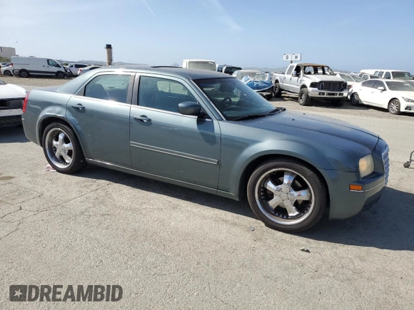 2005 Chrysler 300 with VIN 2C3AA53G65H123302, listed as a Copart auction lot 52449215 with 201,650 mi miles and Clean Title. Bid and sale history available at carsss.com. Image 4.