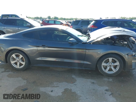 2020 Ford Mustang EcoBoost with VIN 1FA6P8TH3L5169920, listed as a IAAI auction lot 42339107 with 84,748 mi miles and . Bid and sale history available at DreamBid. Image 13.