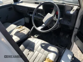 1994 Toyota Tacoma with VIN CM600012981, listed as a Copart auction lot 64052155 with 237,536 mi miles and Salvage title. Bid and sale history available at DreamBid. Image 8.