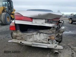 1998 Honda Accord LX with VIN 1HGCG5540WA180862, listed as a Copart auction lot 87071084 with 394,803 mi miles and Salvage title. Bid and sale history available at DreamBid. Image 6.