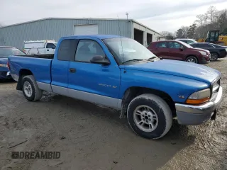 1999 Dodge Dakota SLT with VIN 1B7GL22X7XS121831, listed as a Copart auction lot 43424265 with 201,511 mi miles and Salvage Title. Bid and sale history available at carsss.com. Image 4.