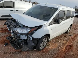 2022 Ford Transit Connect XLT with VIN NM0GE9F22N1511933, listed as a Copart auction lot 86105194 with 24,988 mi miles and Salvage title. Bid and sale history available at DreamBid. Image 1.